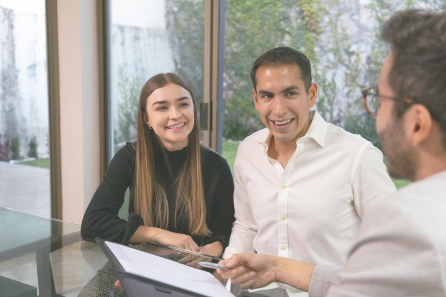 Strategic planning session with financial documents and analysis charts